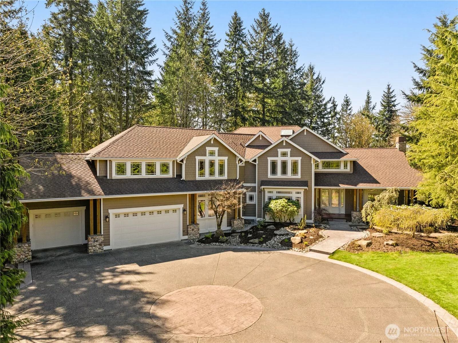 Home facing East - Almost 2.5 acres w/7300+ sq ft/of Fabulous living space w/3 car garage and parking for up to 10-12 additional cars.