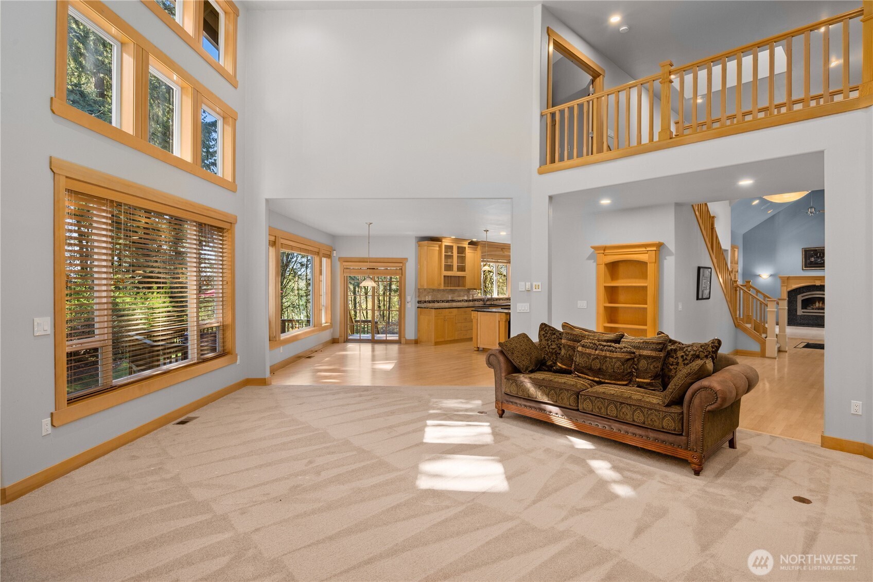 Great room features: Tons of natural light exposure, new carpet, paint, 18ft high ceilings