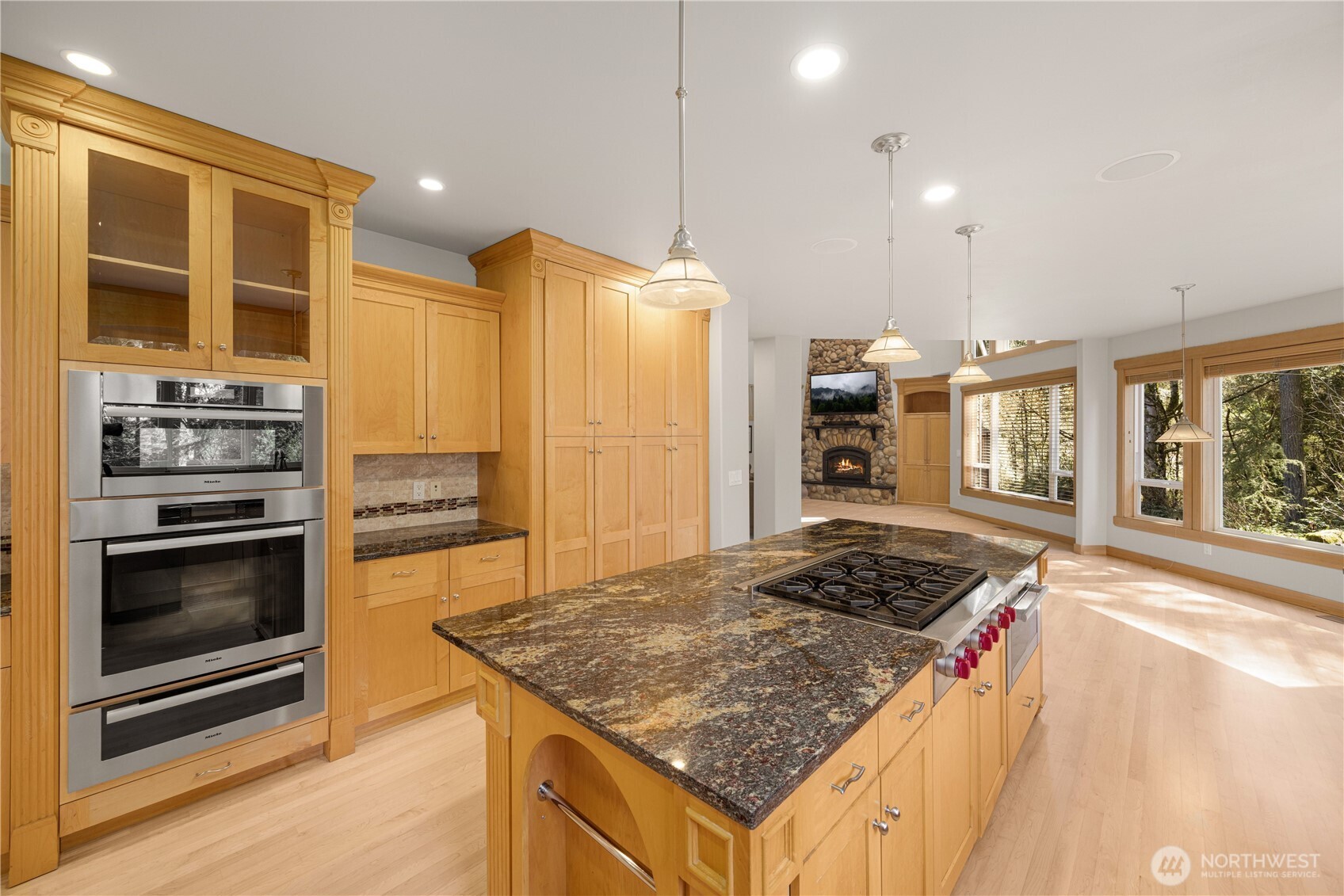 Gorgeous and spacious chef's kitchen features Granite Counters Stainless Miele double oven and microwave, trash compactor, Bosch Dishwasher, 6 Burner - Wolf gas stove and Sub-Zero Fridge.