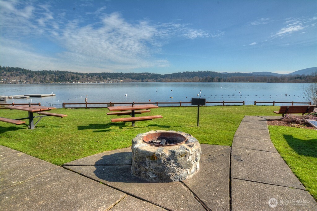 Sammamish Beach Club—home to a private beach, tennis courts, and a shared recreational area designed for connection and enjoyment.