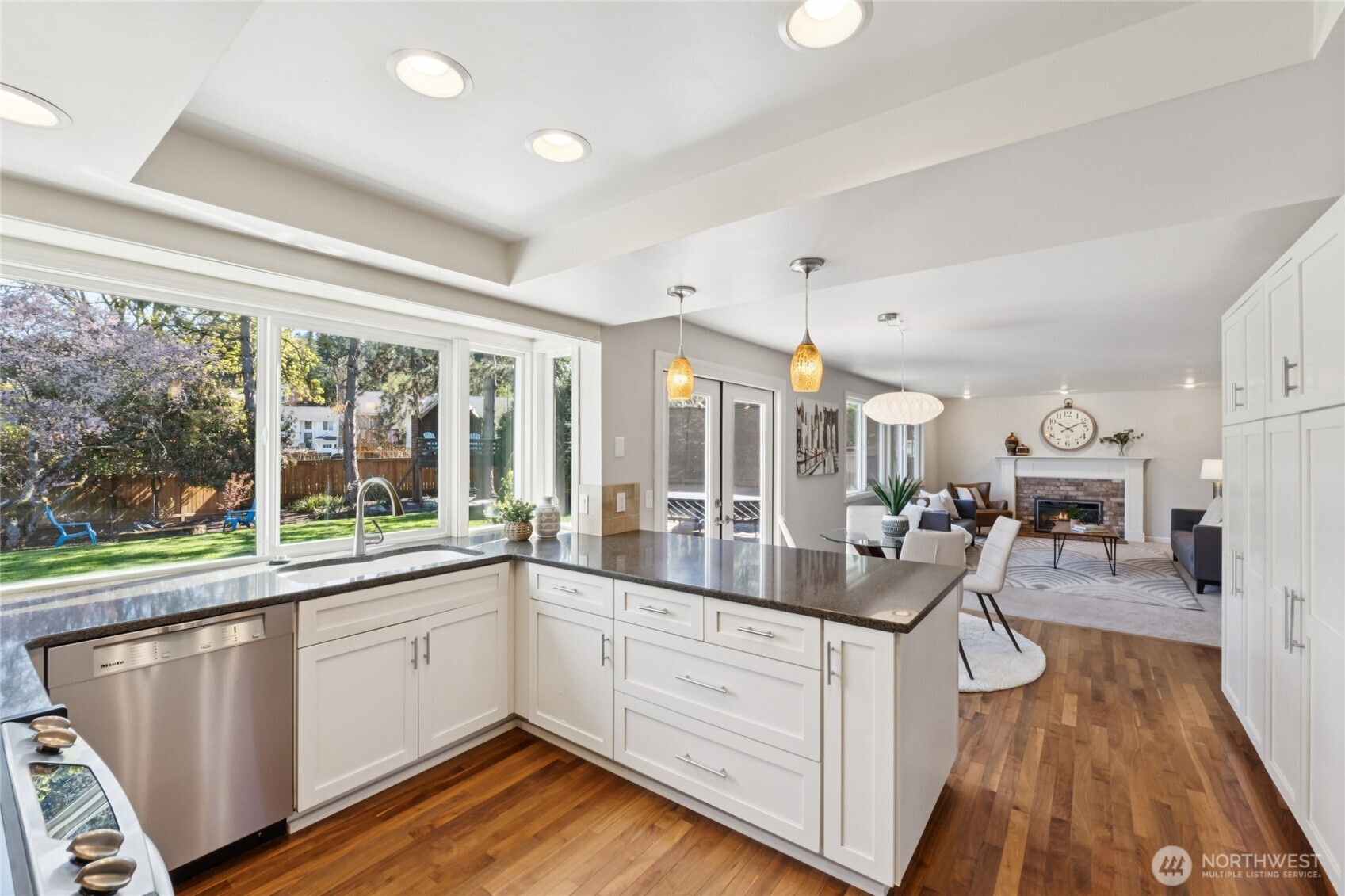 W O W! Walls of windows, French doors and more windows!