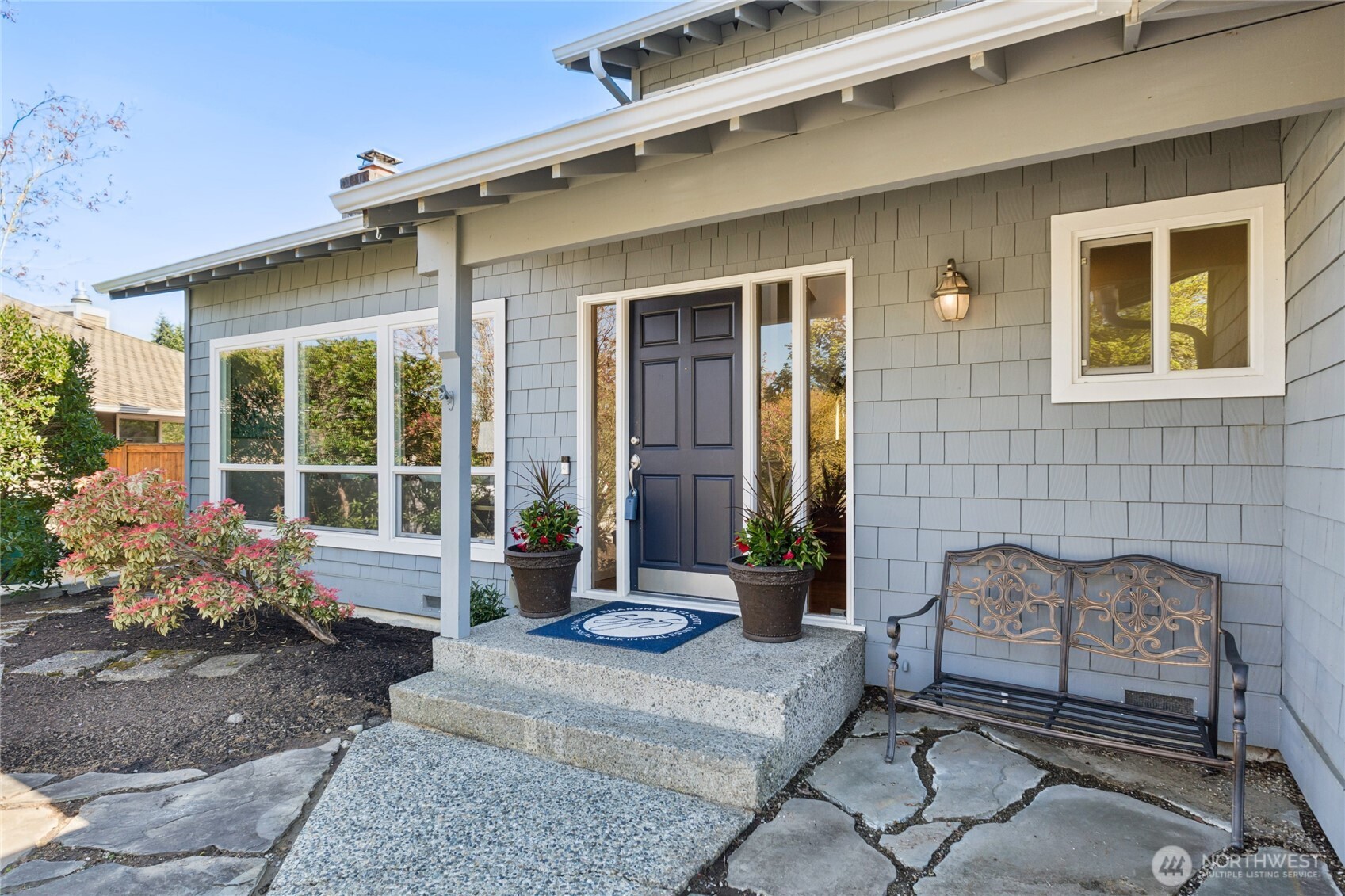 The front entry offers a simple, inviting welcome—where home begins the moment you arrive.