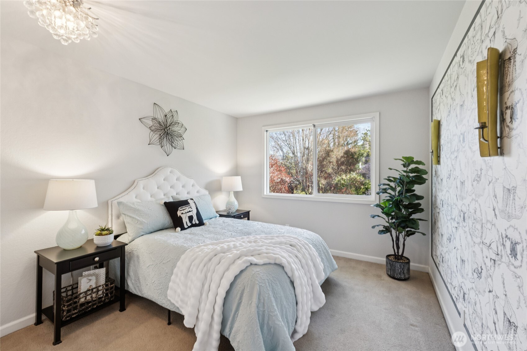 A nicely sized bedroom with a peaceful feel—suited for guests or additional living space.