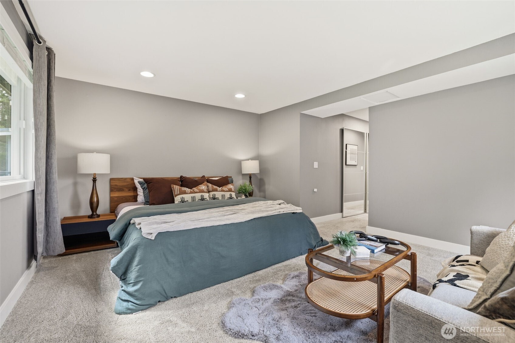 Spacious primary suite with serene setting