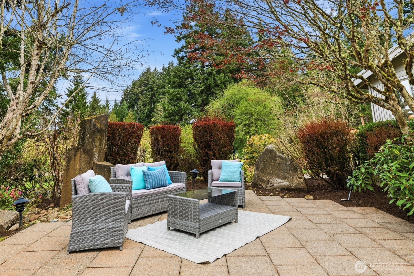 Front yard: Beautiful outdoor retreat with lush landscaping