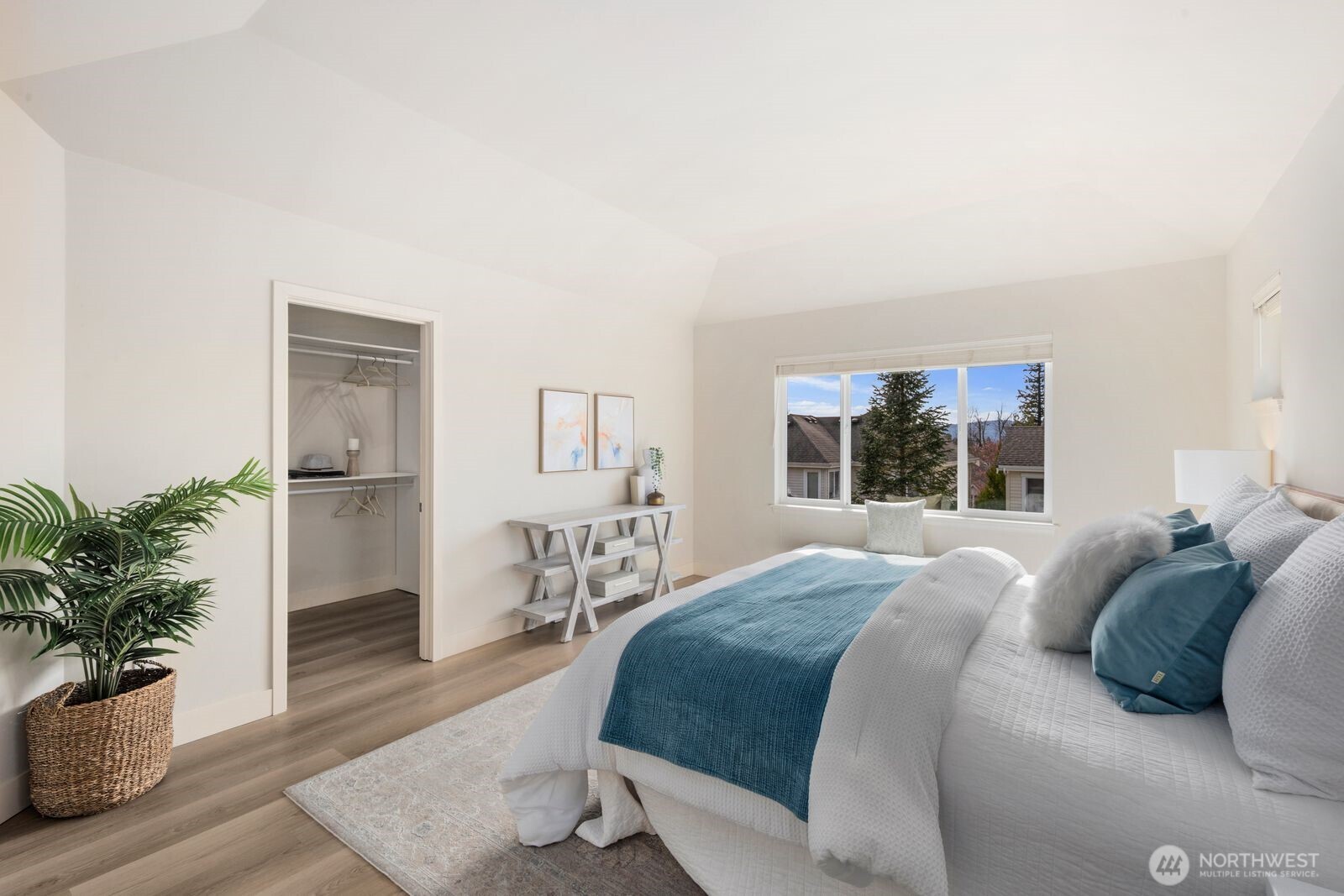 Back in the primary looking towards the walk-in closet.