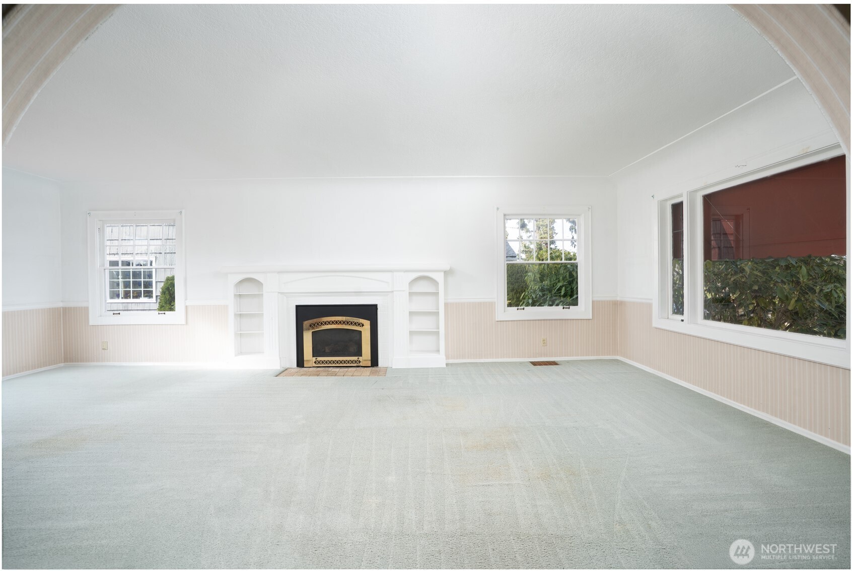The huge picture window in the living room, along with 2 more windows, allows for natural light- even on our grey days.