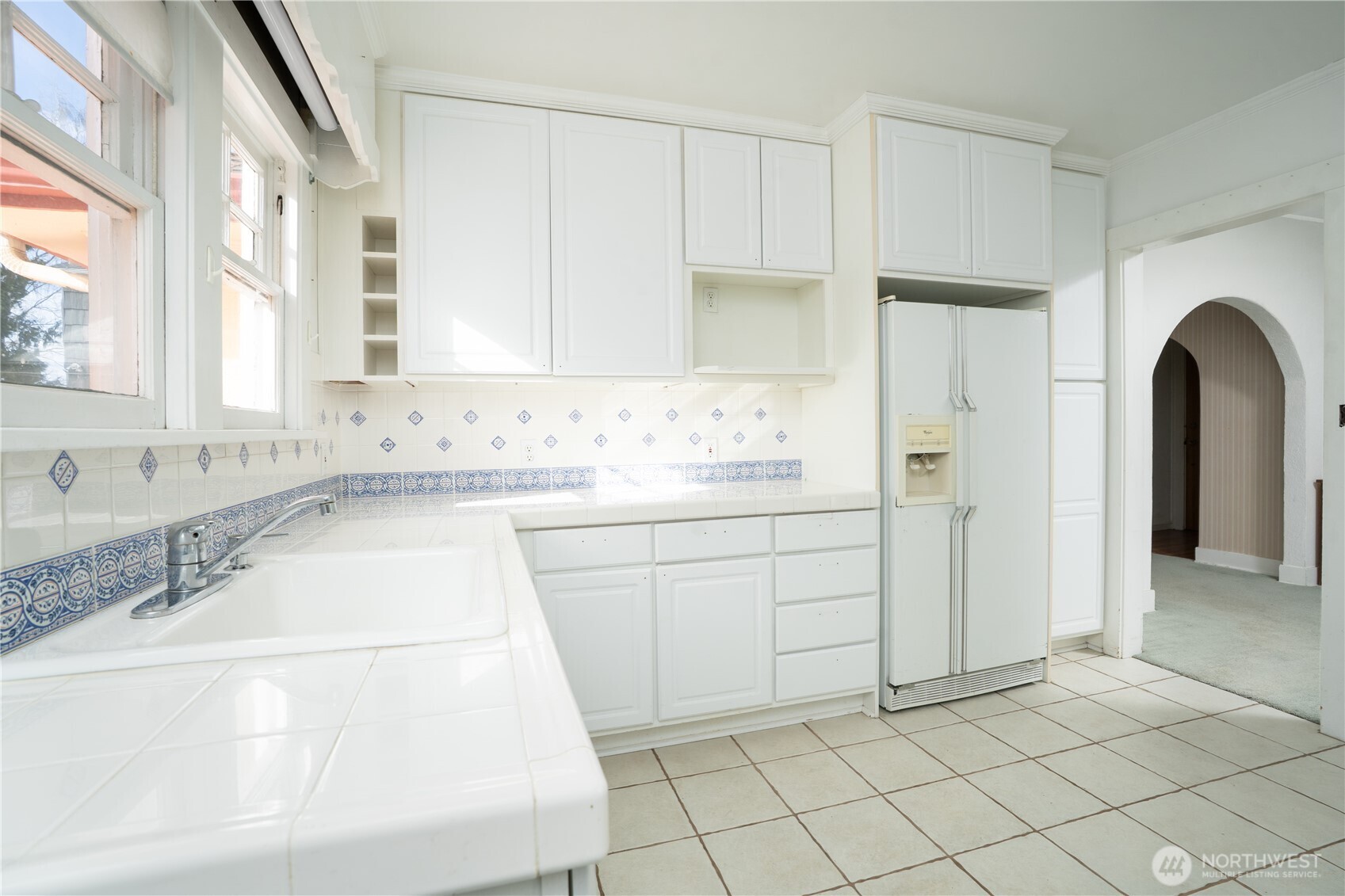 The kitchen is big and has tons of storage.