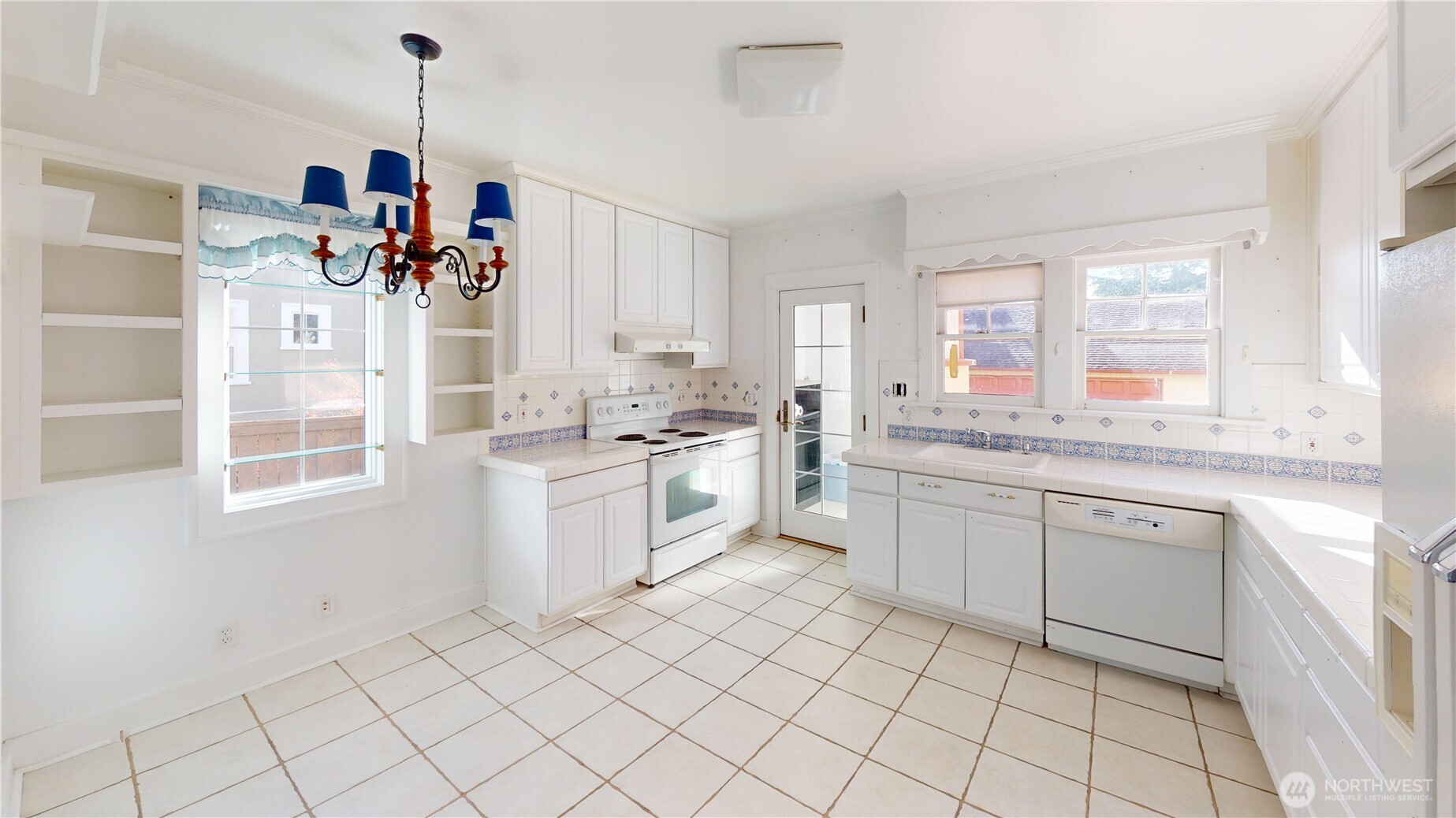 The large eat in kitchen has great bones.  Keep it with informal dining or blow it out and make a chef's dream kitchen- the dining room is adjacent so the op