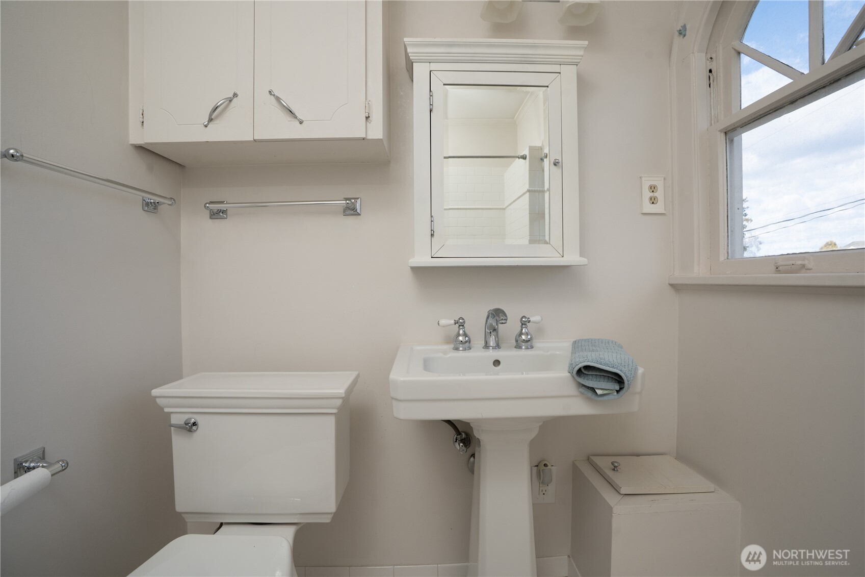 A full bath is located centrally between the 4 bedrooms and it has a fun laundry shoot.