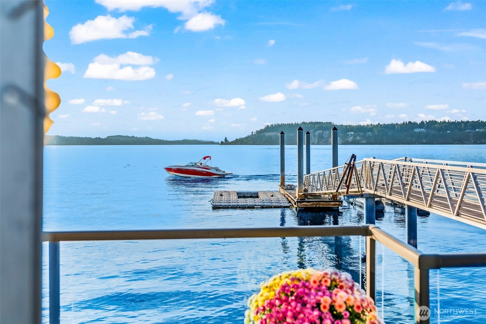 Commercial-grade deep-water dock, impossible to replicate today, extends your backyard into the Sound.