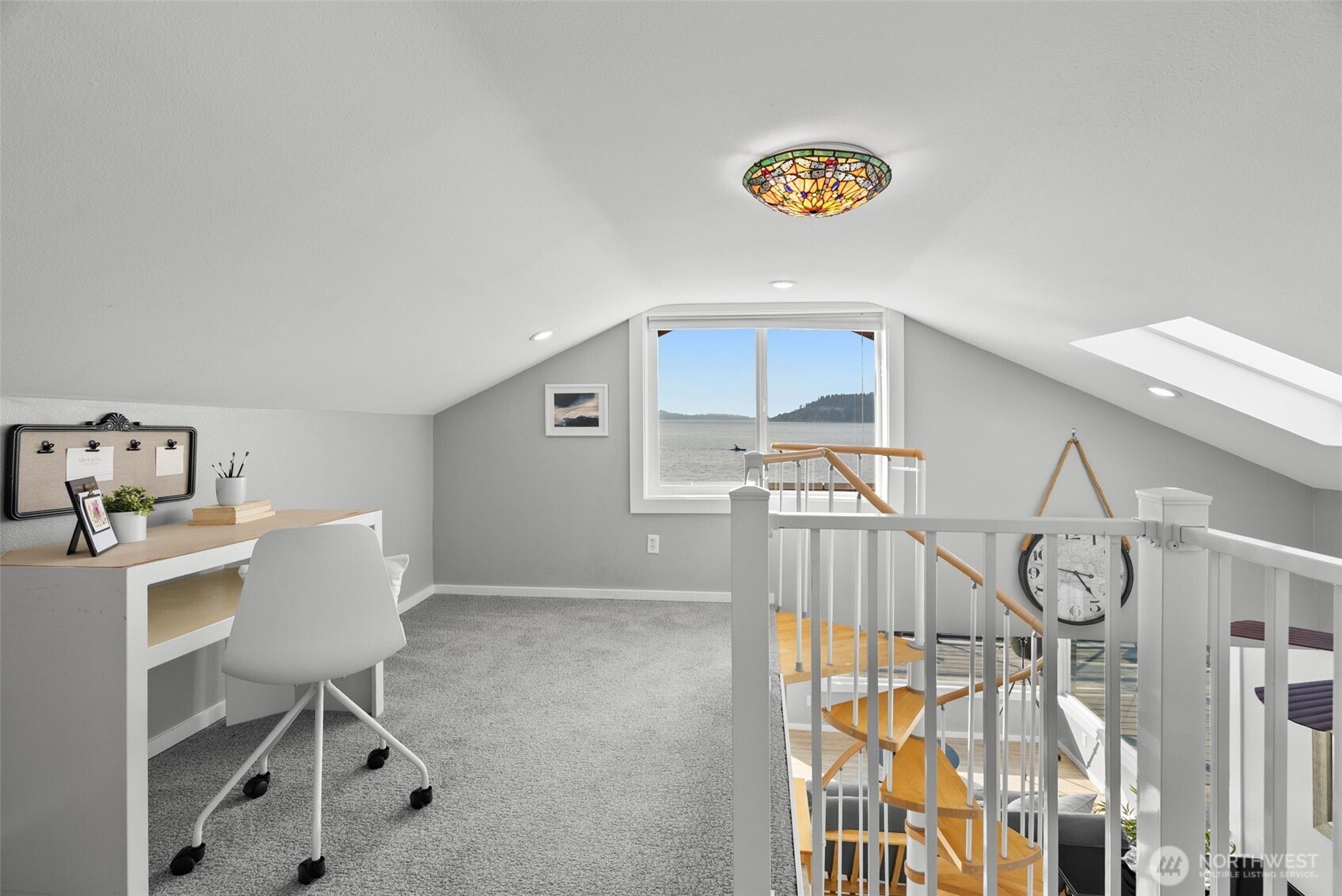 Loft area – flexible space for reading, relaxing, or working with a view.