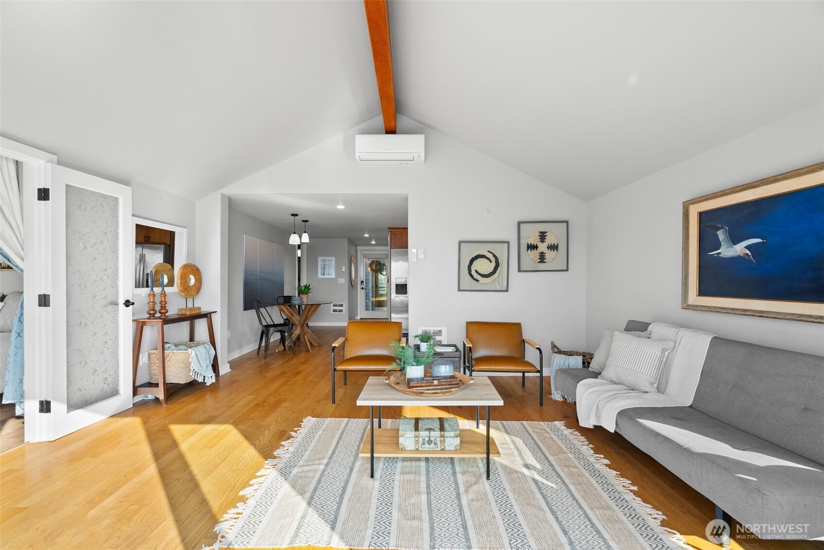 Living room with deck access, designed for easy indoor-outdoor living.