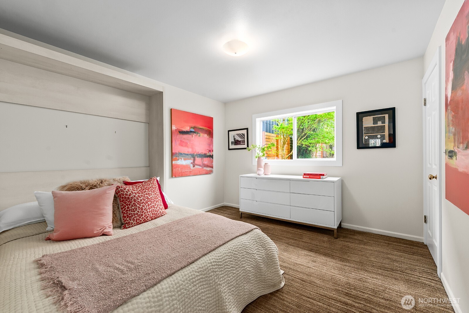 Bedroom one on the main floor with a Murphy bed.
