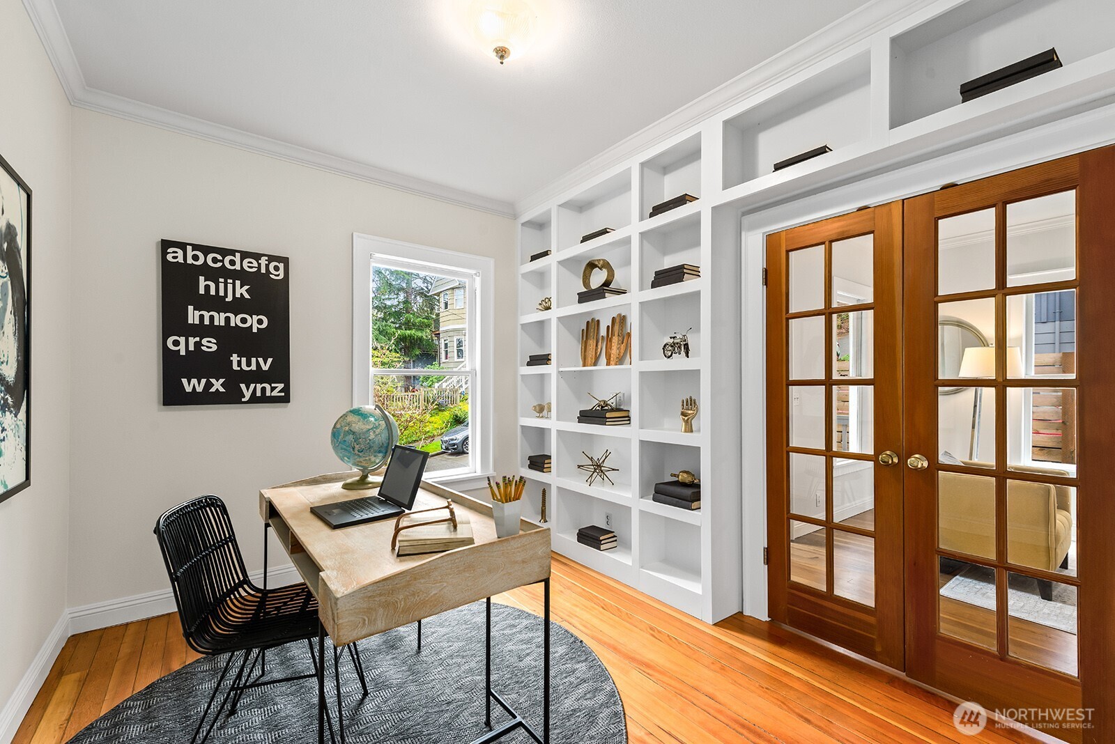 Bedroom two on the main floor (has no closet), makes a great office space.