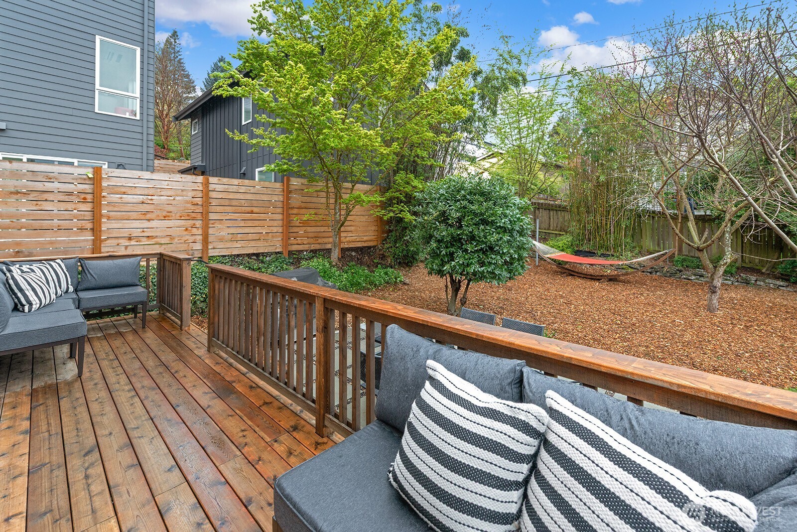 A spacious deck.    and rear yard.