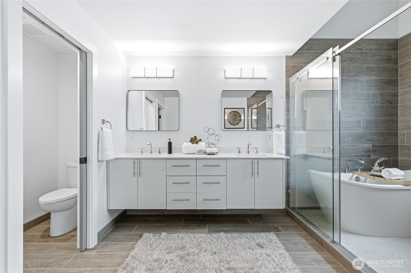 An exceptionally designed, freshly remodeled bathroom.