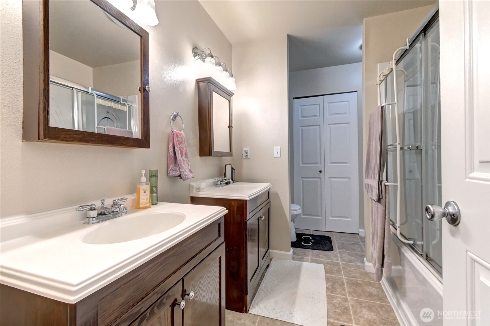 Full bathroom with double vanity on second floor
