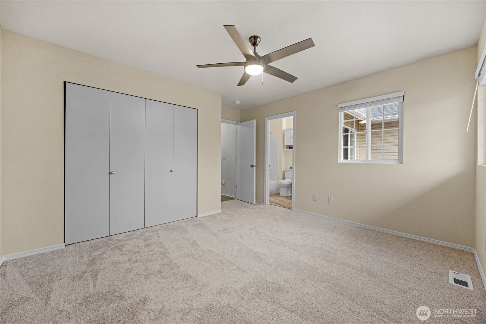 Primary bedroom with full bath ensuite.