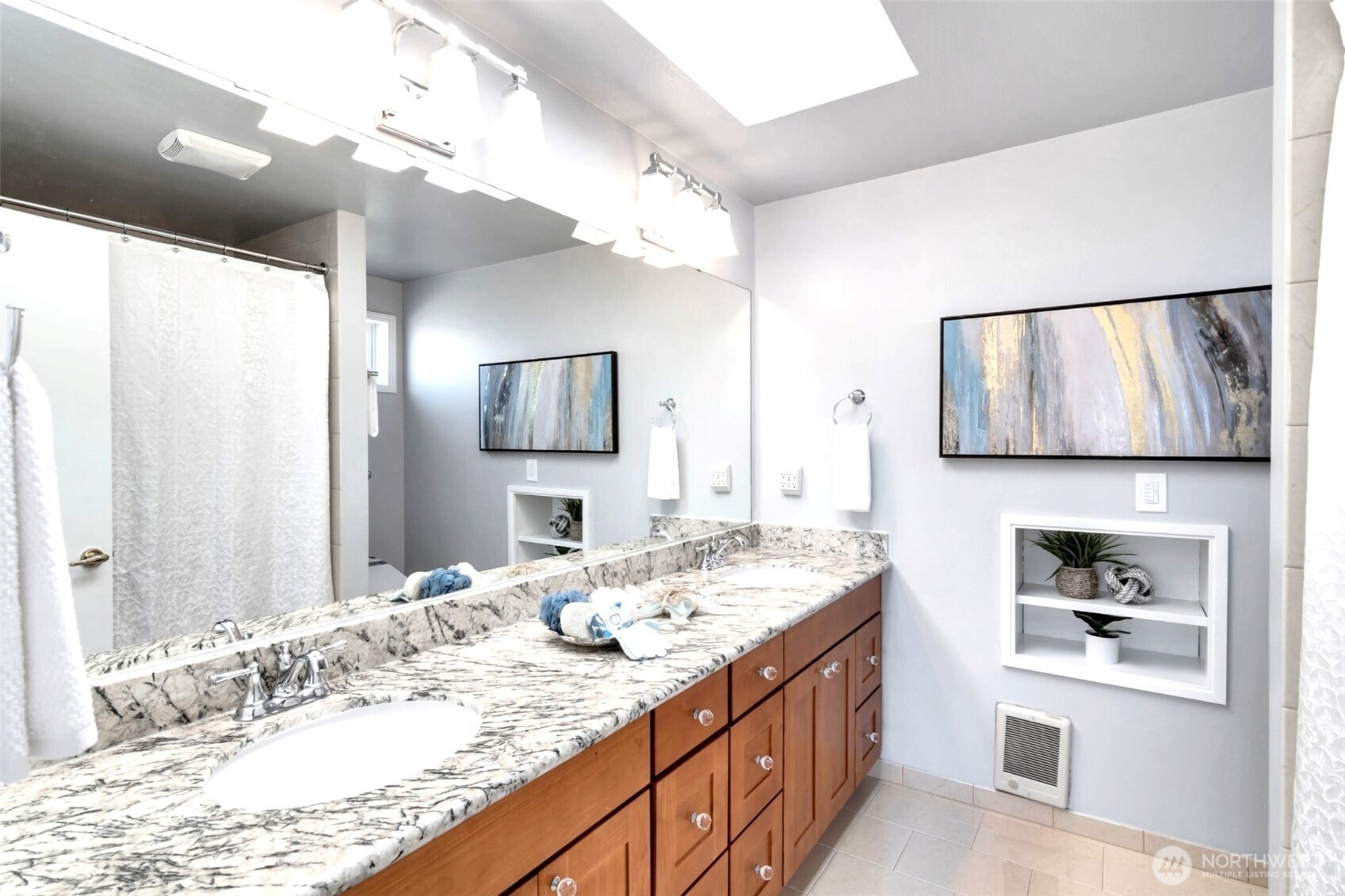 Master bathroom with double vaniy and undermount sinks.