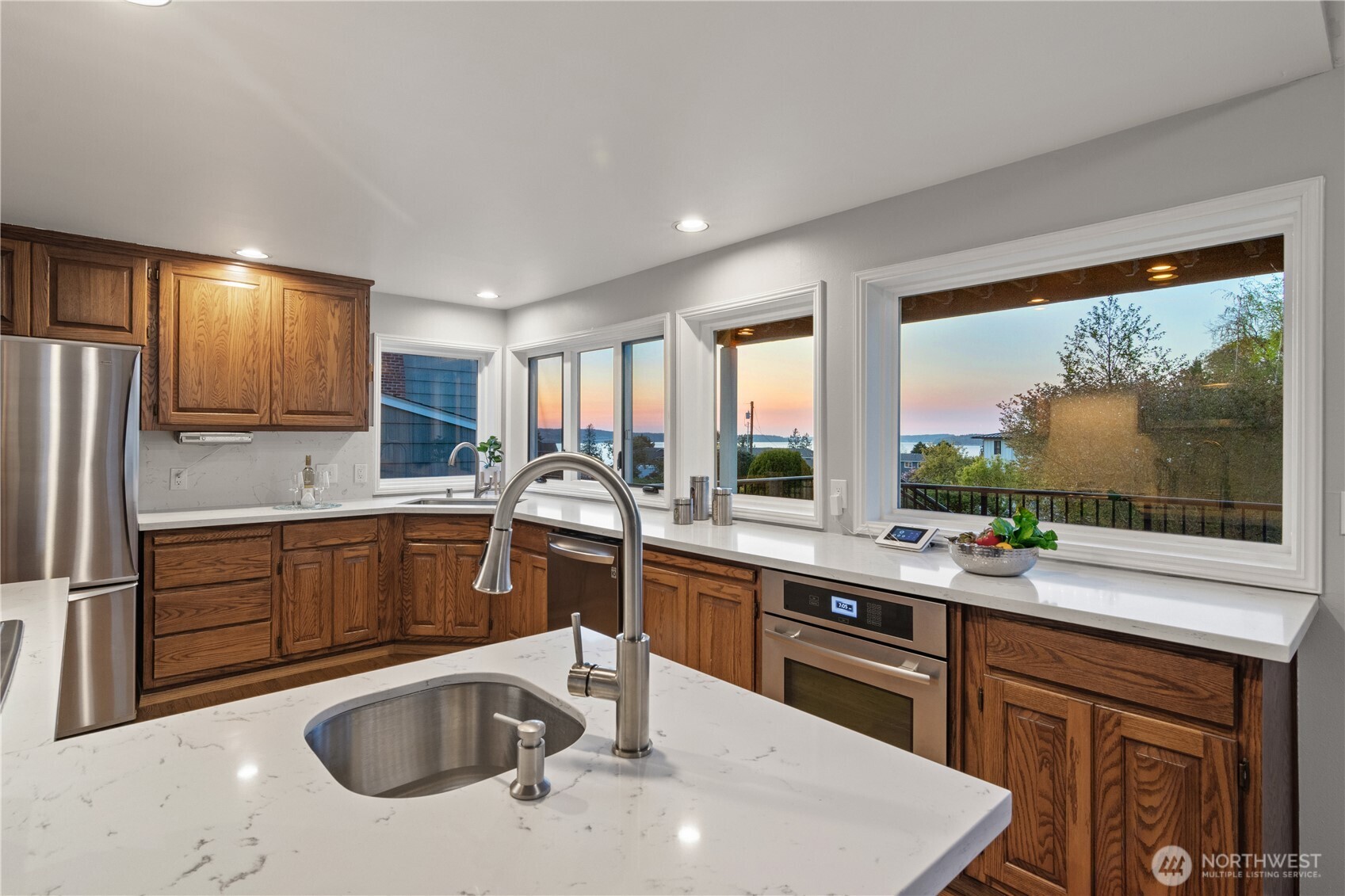 Year Around Water views from this large, updated kitchen. Quote for sanding and painting cabinets available at a very affordable cost
