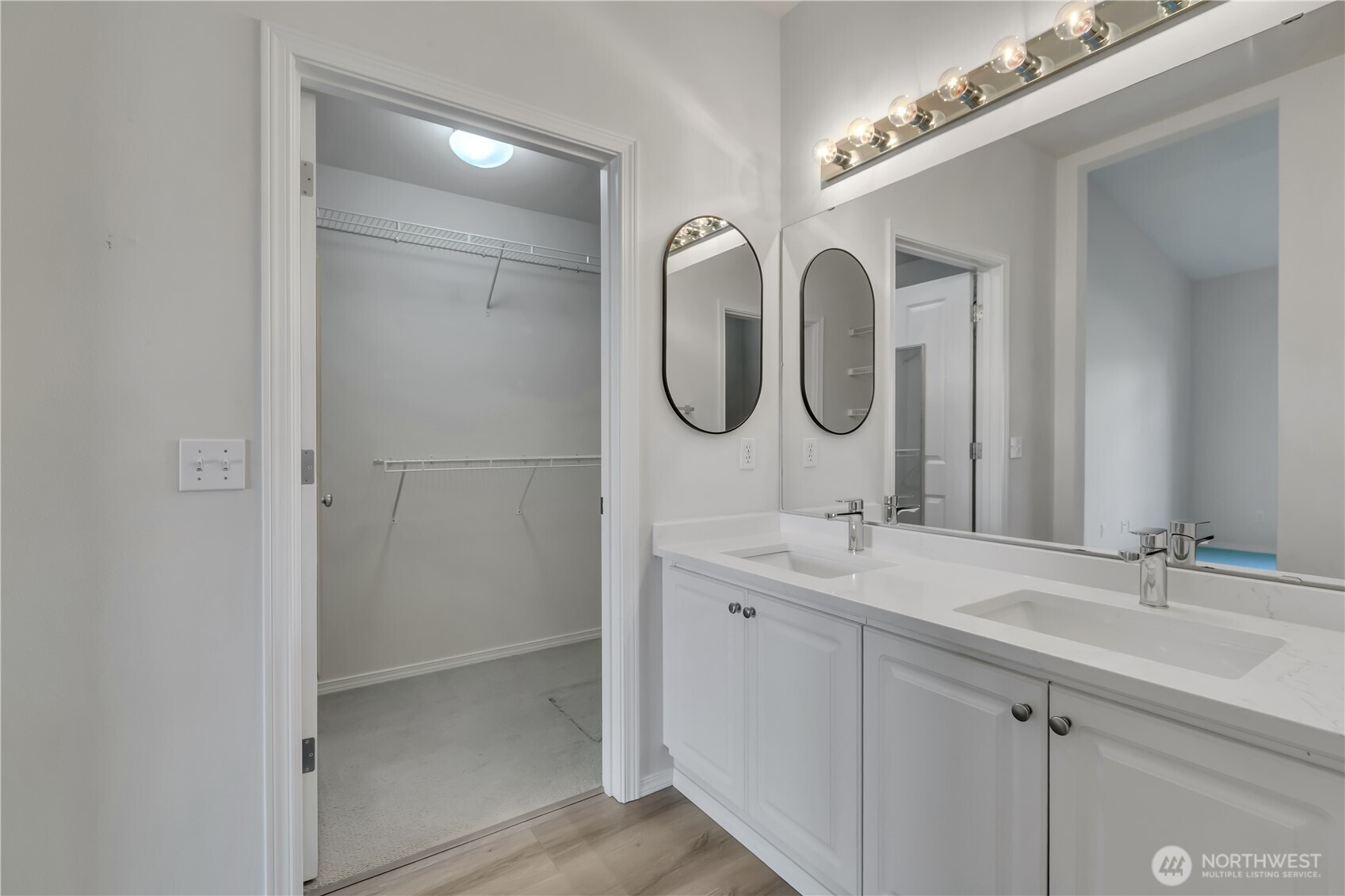 Walk in closet, double sinks with new quartz counters ~