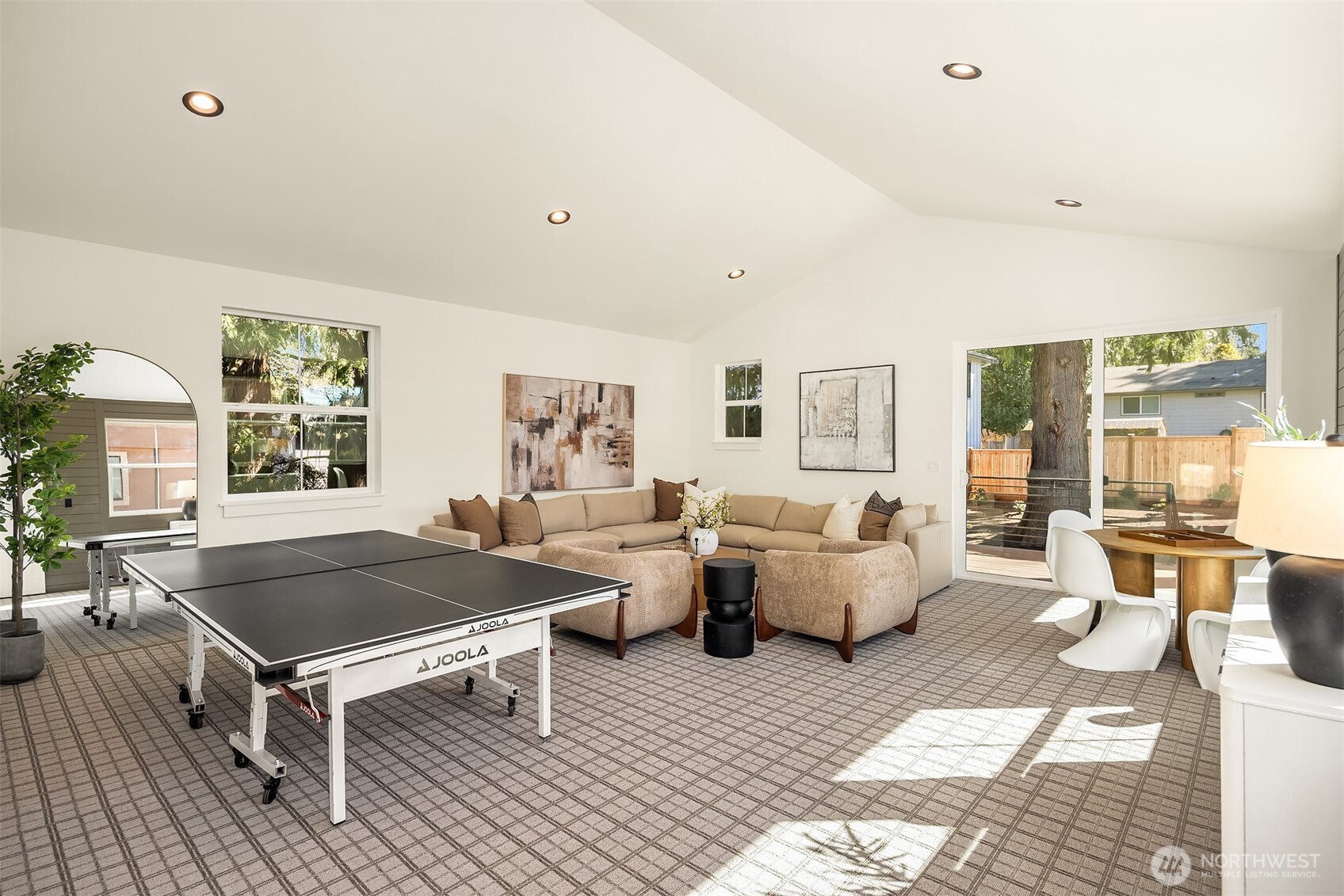 Fantastic rec room leading to back deck and yard