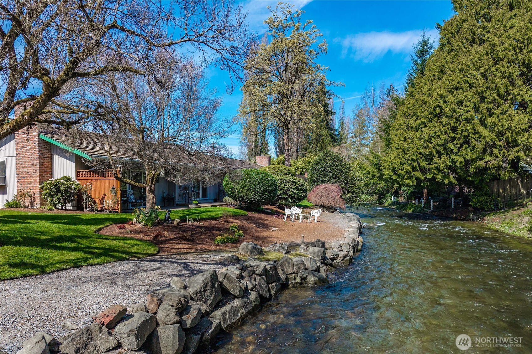 View of backside of home on Creek Frontage