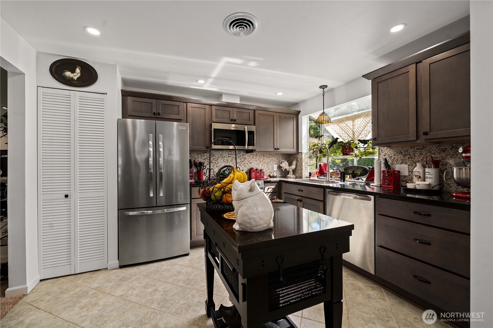 Includes custom island w matching quartz counter