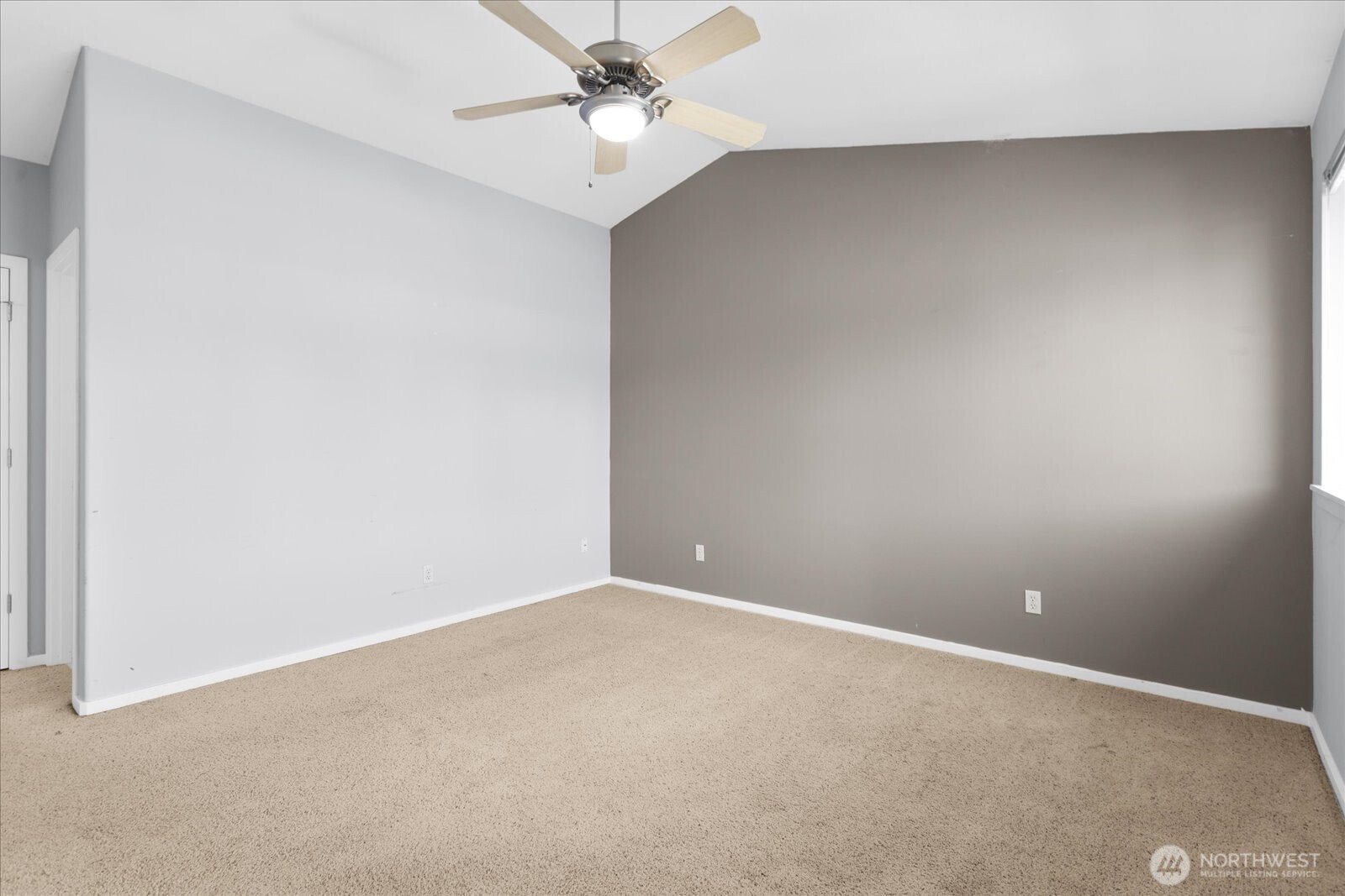 Another view of the primary bedroom.