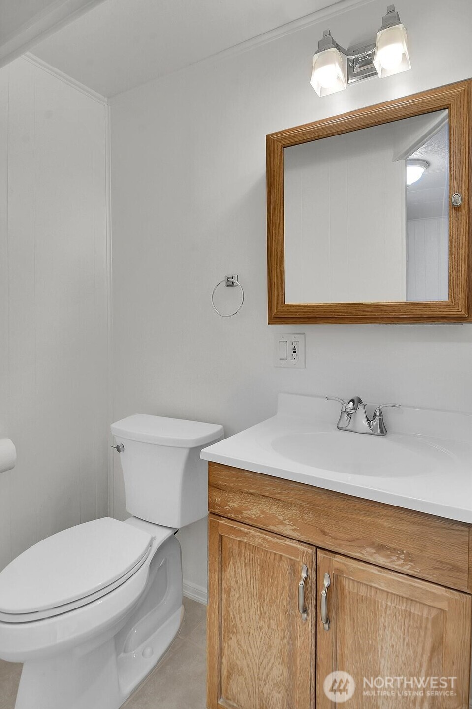 Half-bath off of the utility/flex room.