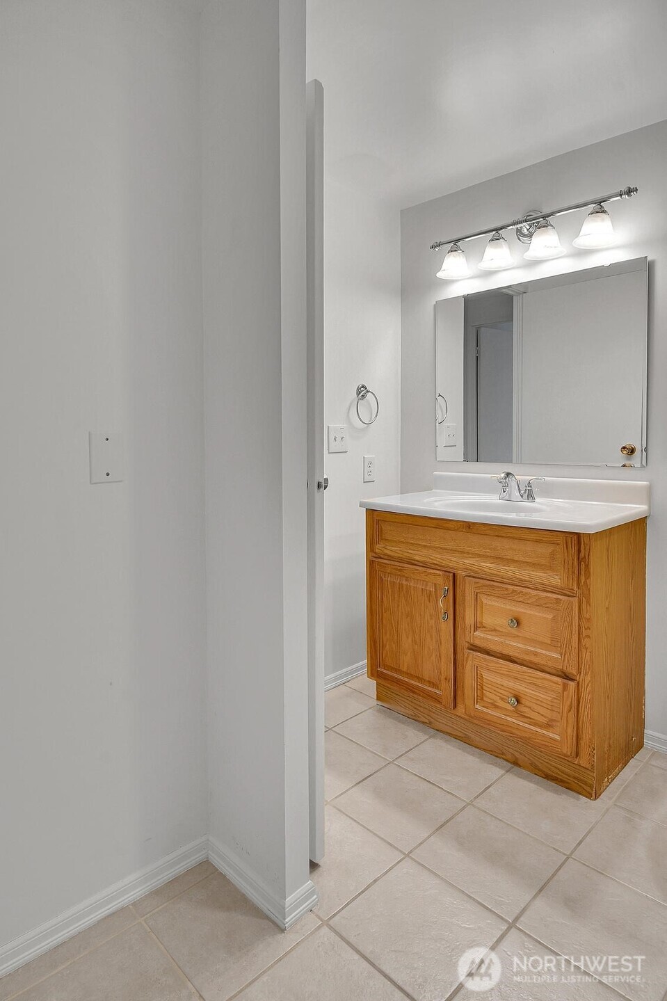 View of primary bath from primary bedroom.