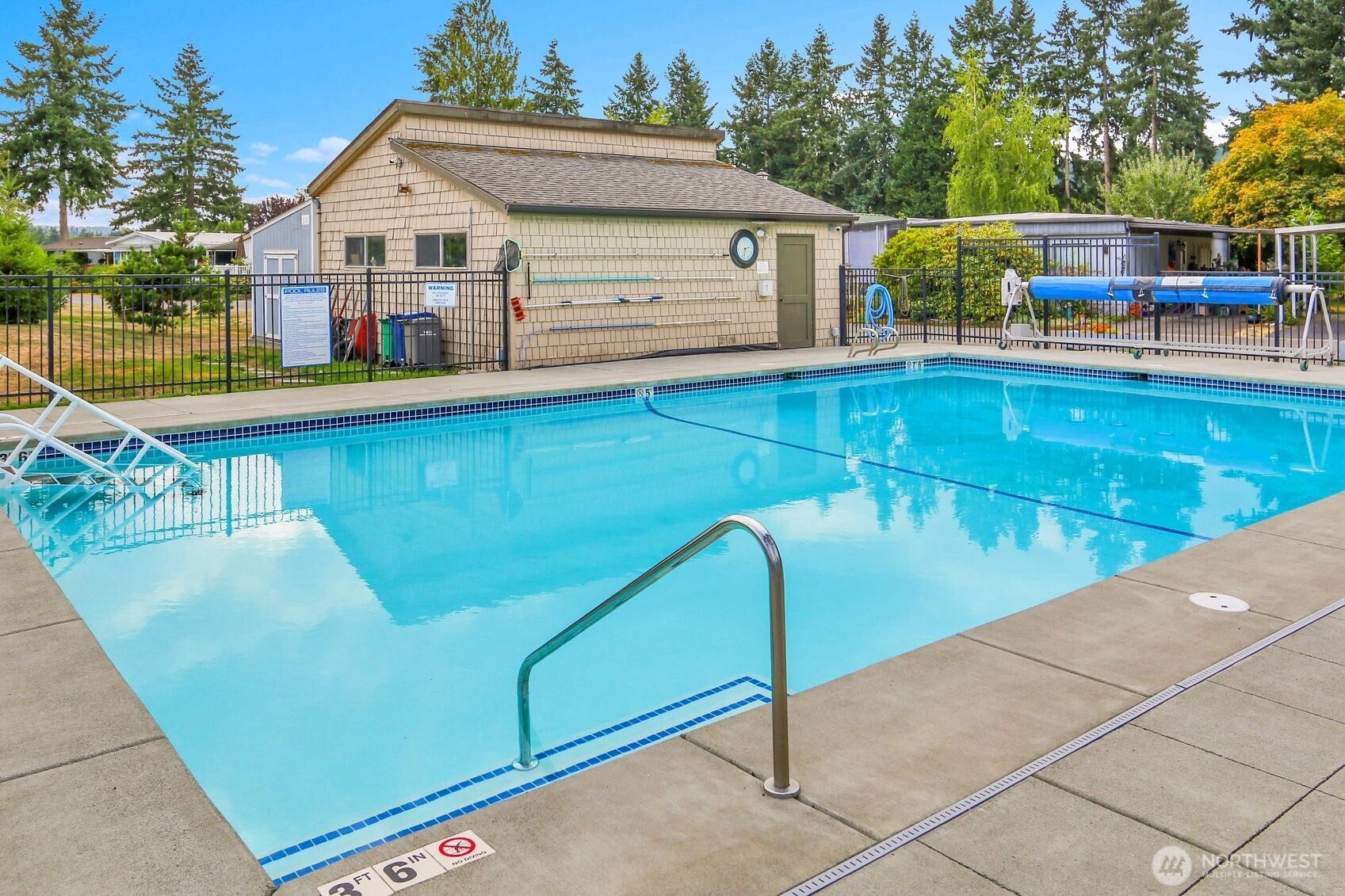 This crystal clean seasonally heated pool is an added bonus for summertime exercise and relaxation.