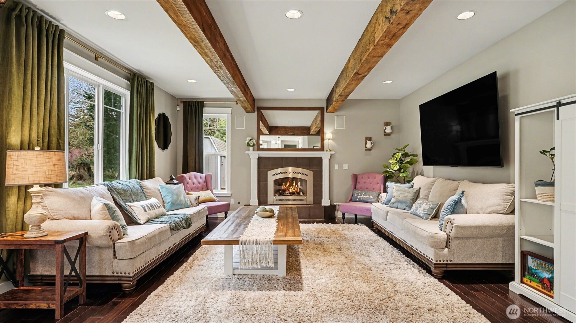 Enjoy exposed beam ceilings and a warm fireplace.