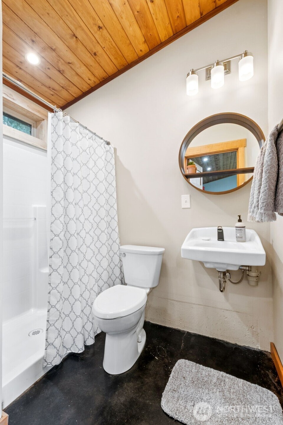 The laundry is beautiful too! - And practical with plenty of wood cabinets and the granite folding counters!