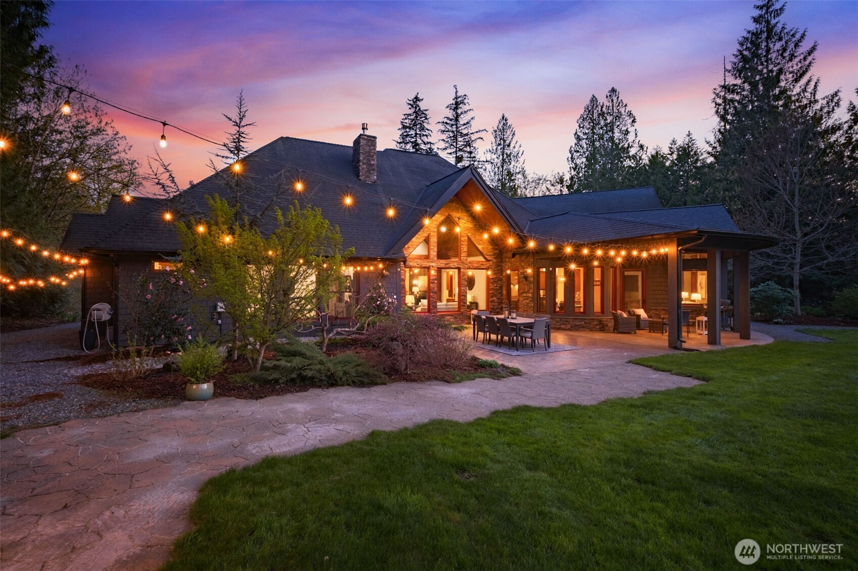 The architecturally rich, versatile detached cabana/studio offers exceptional flexibility—perfectly positioned on the expansive, level lawn and ideal for gatherings, celebrations, or everyday enjoyment. Currently used as an exercise space, it is fully equipped with a bath and kitchenette, making it a turnkey option for a guest suite, studio, or potential ADU