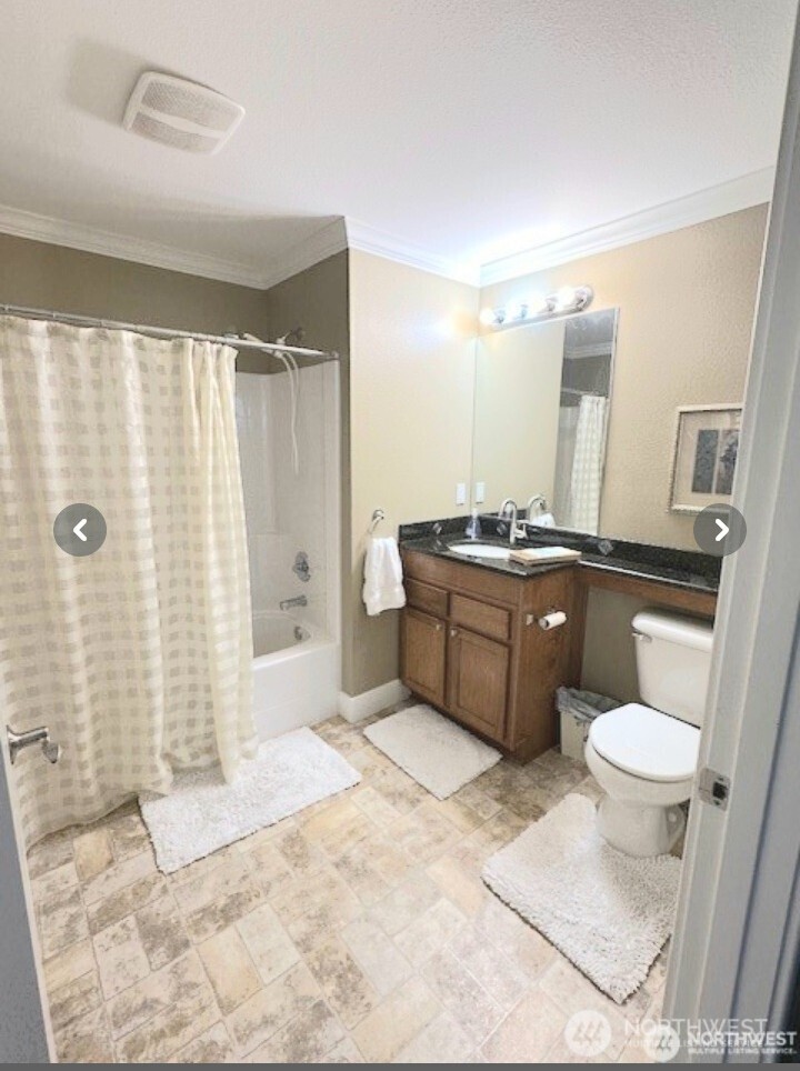 This is a bedroom too but the owner had an office set-up installed.