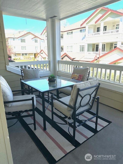 A guest bath with a tub is located near the two bedrooms.