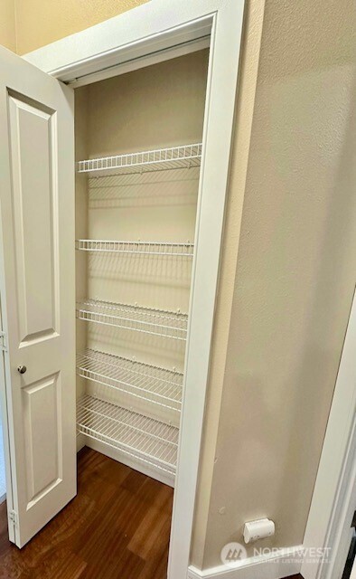 A linen closet near the bedrooms.