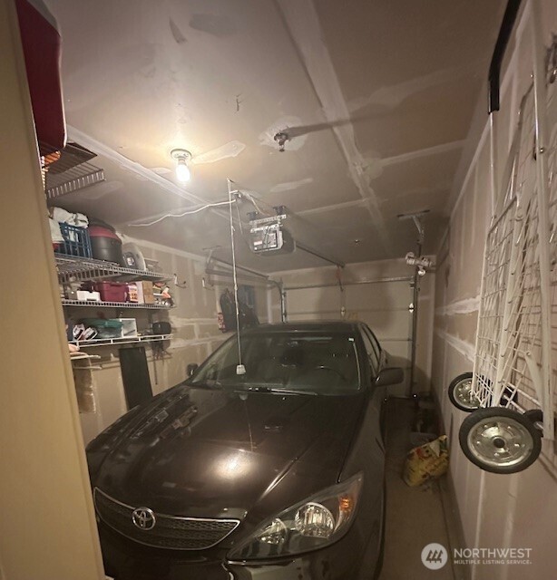 One car garage and storage (not pictured) comes with the condo too. From your car you just enter the hallway that leads to the elevator.  No going outside or down around the corner to get to your building.