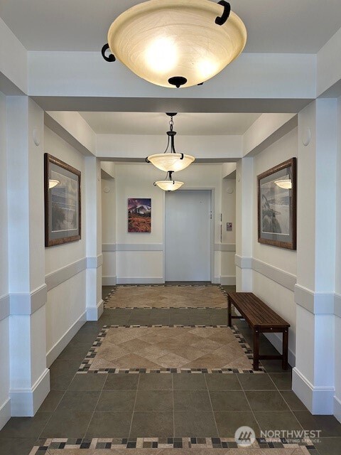 The building has a locked secure entry on one level.  The elevator is a short distance after entering the building.