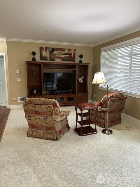 Living room area with large wall area for your TV.