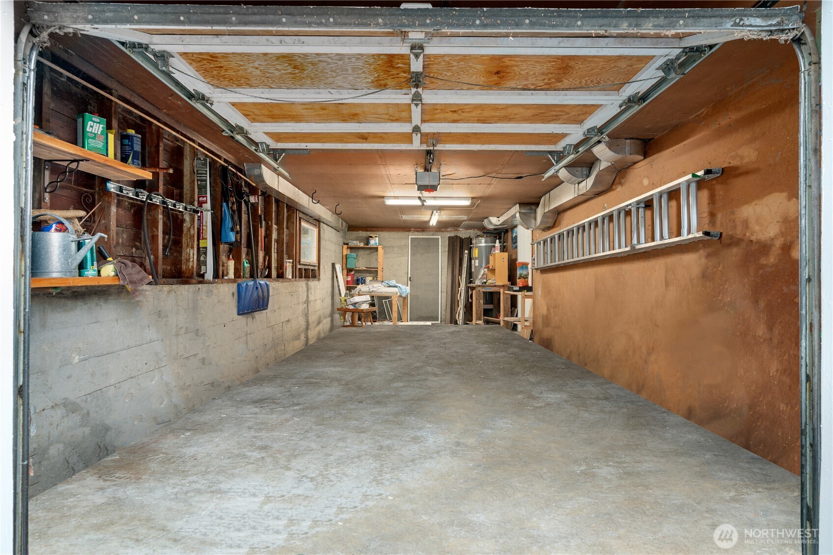 Oversized garage has room for your car, tools and equipment.