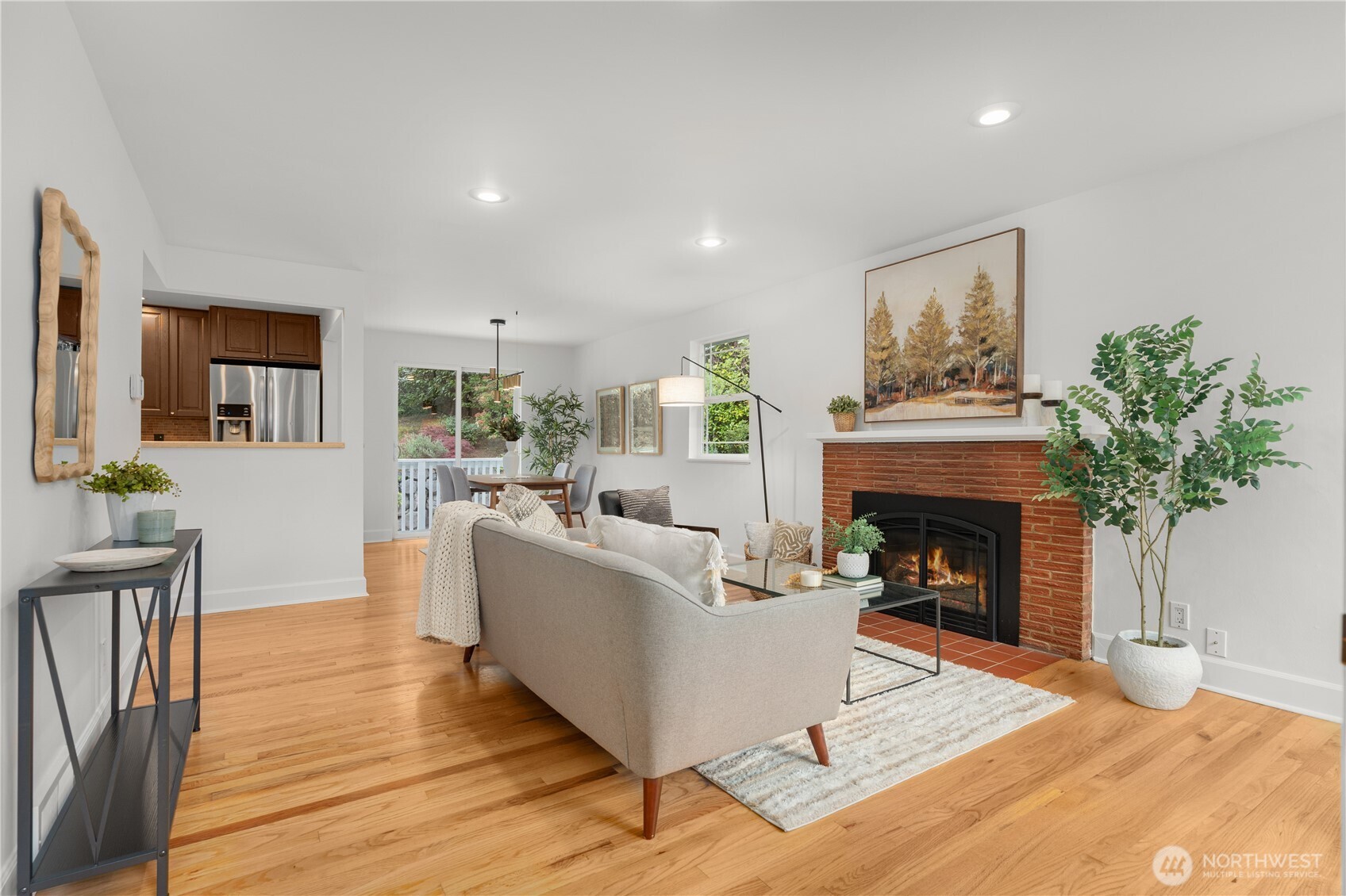 Super ambiance-enhancing gas fireplace is your focus as you enter