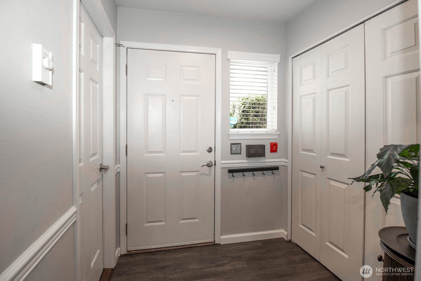 Entry from front door and garage door on left.  Entry closet on right