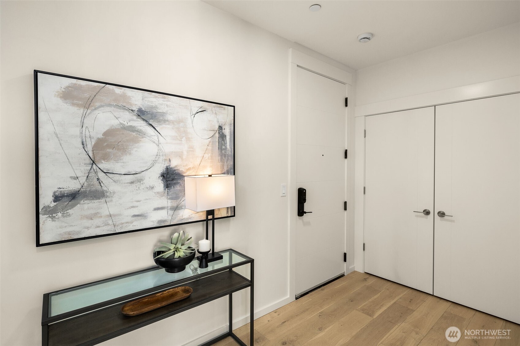 Spacious entry features a coat closet.