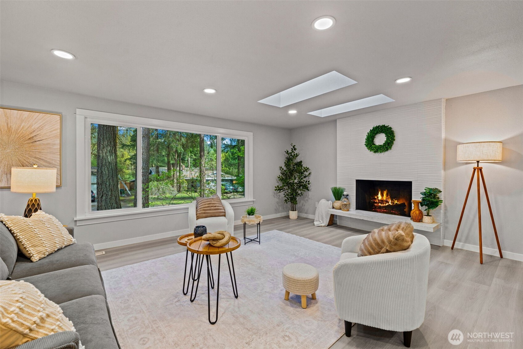 All new windows, flooring and tile on that gorgeous woodburning fireplace~