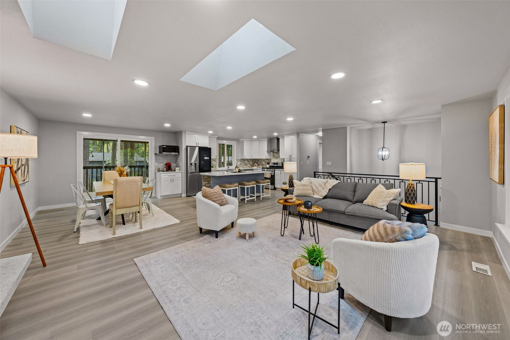 Full view of the living room, dining area and that GORGEOUS kitchen!