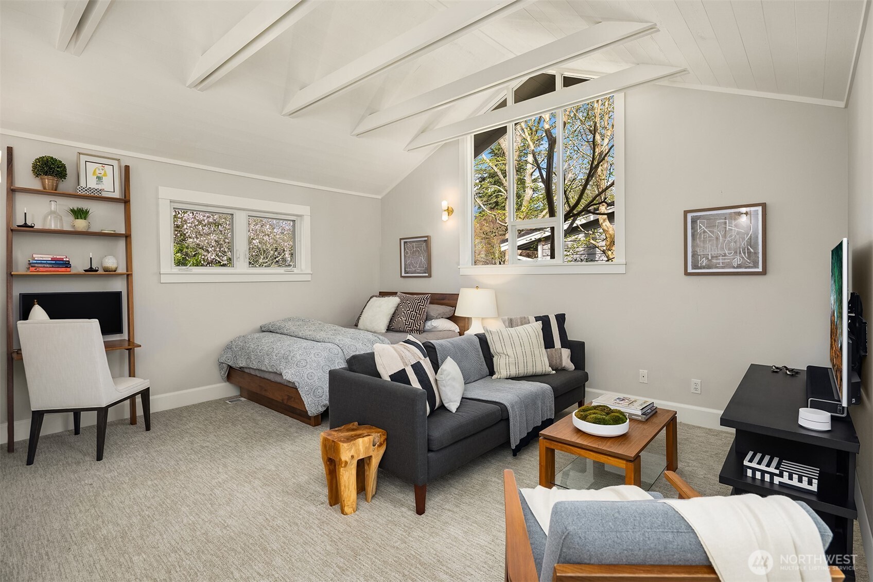 This main floor bedroom is really a retreat- easy to use as a second primary.