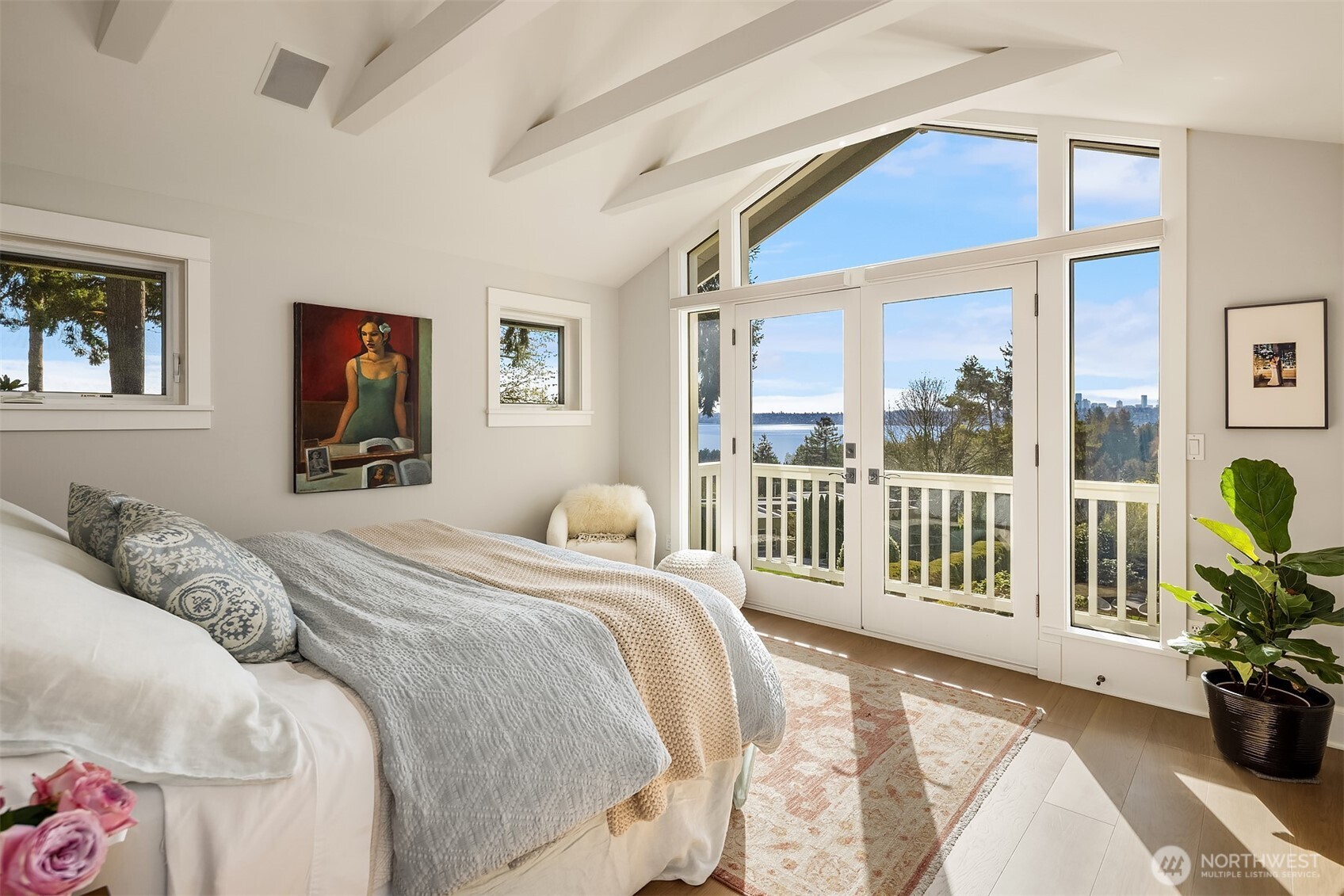 Primary with new hardwood flooring.